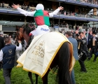 a-jubilant-frankie-dettori-returns-off-the-track-after-winning-on-without-parole