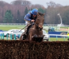the-galloping-bear-and-ben-jones-plough-through-the-haydock-mud-to-win-the-william-hill-grand-national-trial-uk-19-02-2022
