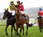 handing-over-the-crown-paul-townend-congratulates-jack-kennedy-on-minella-indo-after-the-pair-won-the-gold-cup-uk-cheltenham-19-03-2021