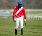 jack-kennedy-walks-back-after-falling-from-envoi-allen-in-the-marsh-novices-chase-uk-cheltenham-18-03-2021